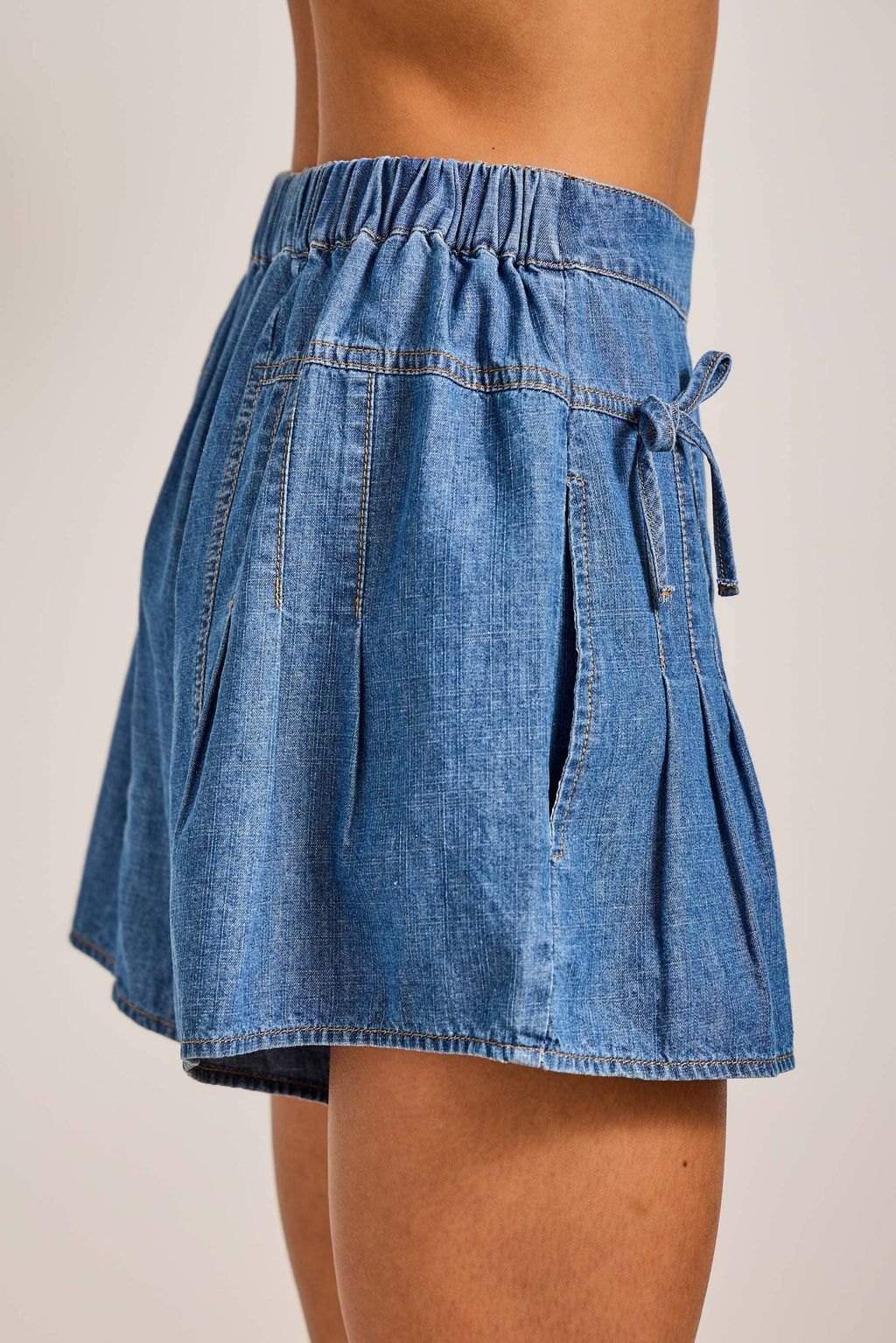 Denim Pleated Shorts with Bow Tie Detail: DENIM / M